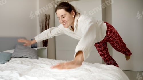 Preview: Woman runs towards the bed and throws herself onto it. Surrender and relaxation
