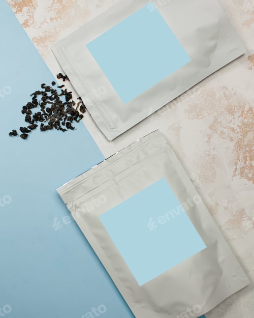 Preview: Aluminum bags with black tea with blue label for text, your logo. Layout.