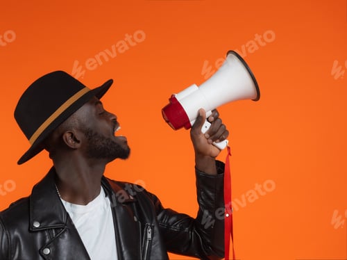 Preview: Black man with megaphone making announcement