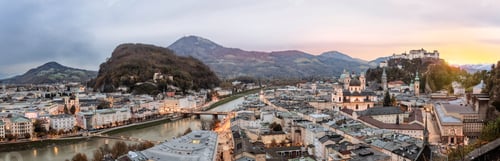 Preview: Panoramic shot of a beautiful city with a river and mountains surrounding it
