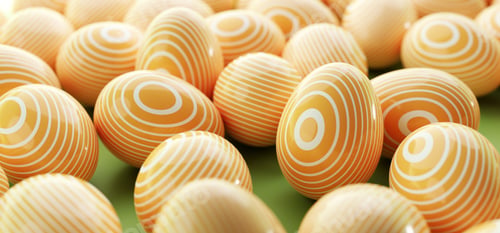 Preview: Easter eggs painted in pastel colors stripes on white