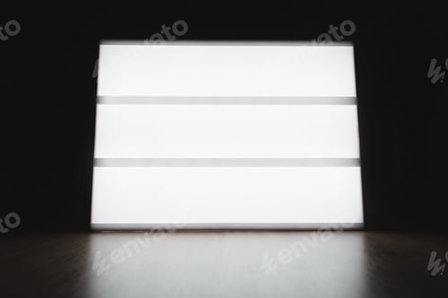 Preview: White lightbox with customizable design on wooden table.