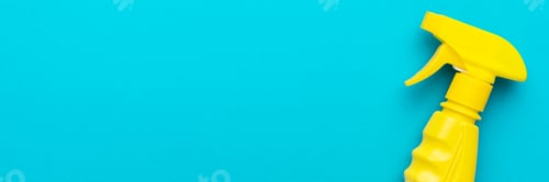 Preview: Flat Lay Image Of Yellow Plastic Dispenser On Blue Background With Copy Space