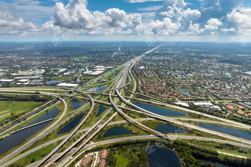 Preview: American highway junction with fast driving vehicles in Miami, Florida