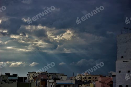 Preview: a city that has some very big buildings in it and is under the sun rays