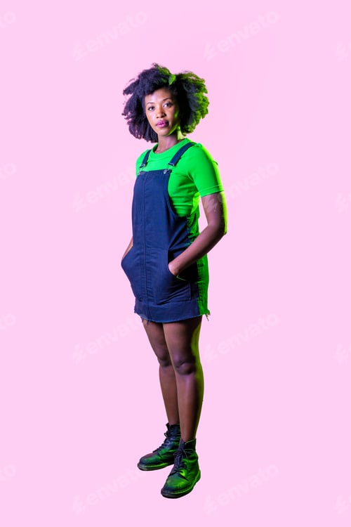 Preview: Young black woman looking camera smiling isolated pink background