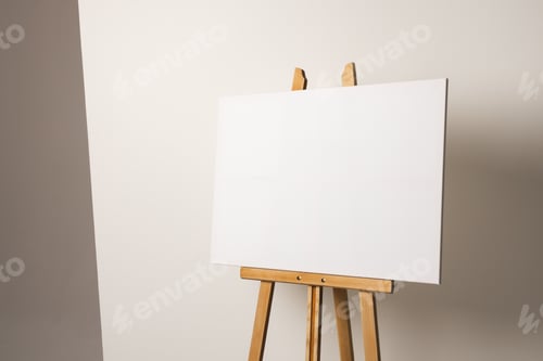 Preview: Blank Canvas on Easel Against White Background