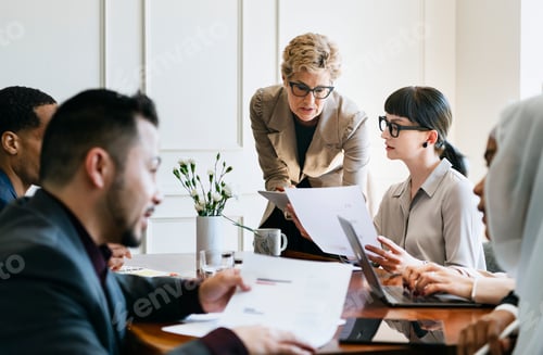 Preview: Business people having a discussion in the meeting room