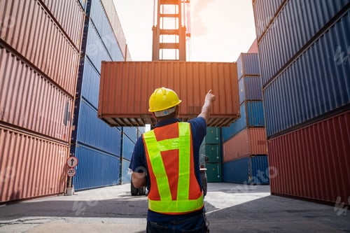 Preview: Male Container yard worker control and checking container.