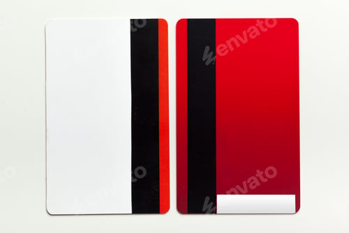 Preview: Two red and white cards with black stripes placed next to each other on a light background
