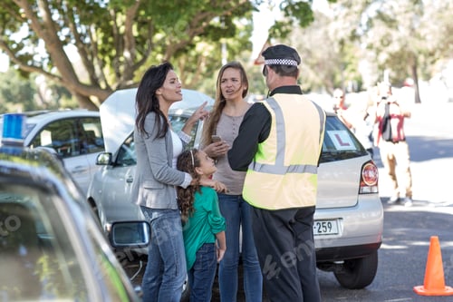 Preview: People and policeman at car accident scene