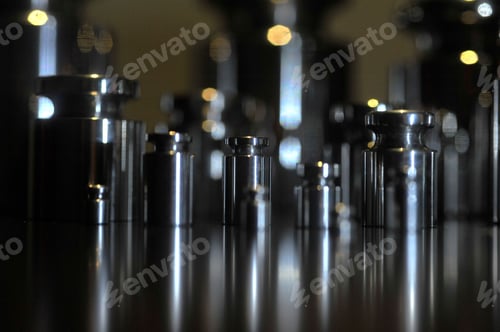 Preview: Closeup shot of different metal wight measurements on a table