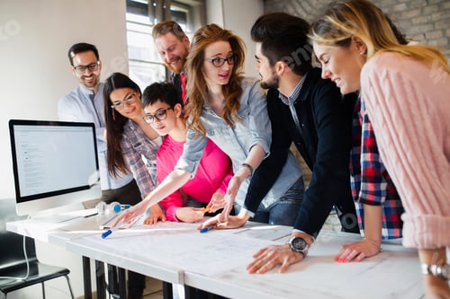 Preview: Young group of architects discussing business plans