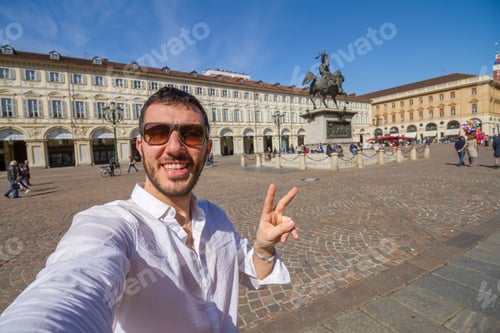 Preview: Young Man Tourist Standing On The Famous San Carlo Square In Turin City. Traveling In Piedmont