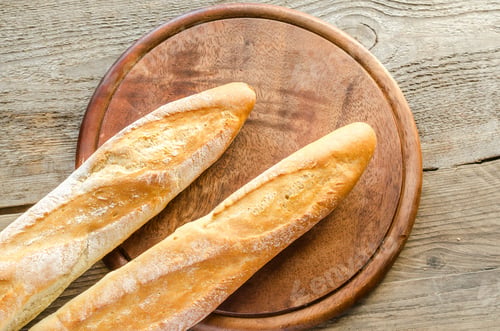 Preview: Two baguettes on the wooden tray