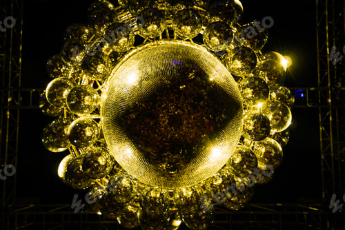Preview: Shiny golden disco ball.