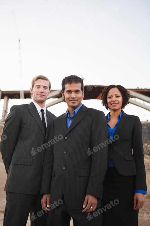 Preview: 2 men and 1 woman smiling on worksite
