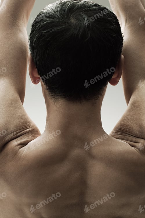 Preview: Muscular mature man, rear view