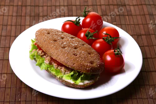 Preview: Tuna Sandwich with Tomatoes on White Plate