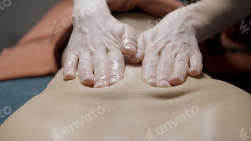 Preview: Close-up relaxing back massage. Action. Professional back massage for relaxation in spa. Relaxing