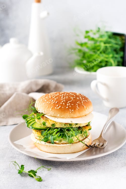 Preview: Burger healthy vegetarian with egg and pea shoots and seeds microgreen, fresh salad, cucumber slice