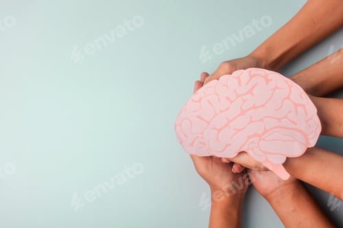 Preview: Hands Unite To Holds Human Brain. Support For Epilepsy Survivor.