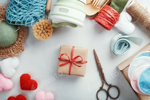 Preview: Set of eco presents laid out on the table. Zero waste gift wrapped in paper.