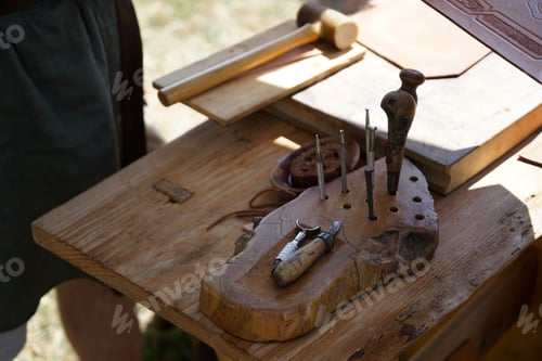 Preview: High angle shot of a small workshop for handcrafted leather processing