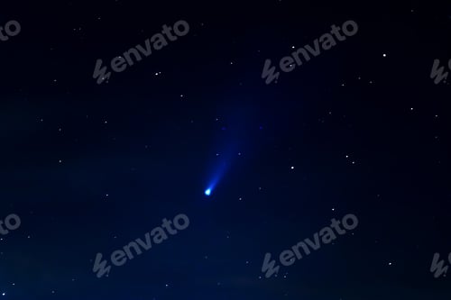 Preview: Comet Neowise in the night sky. Astrophotography - meteor on a starry background.