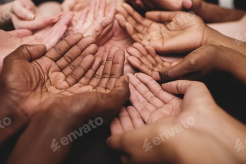 Preview: Show your support towards a good cause. Cropped shot of a group of hands held cupped out together.