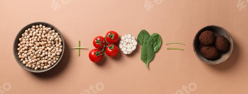 Preview: Ready falafel with ingredients on a brown background.