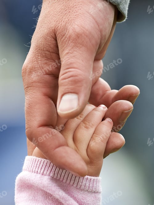 Preview: Child and parent holding hands