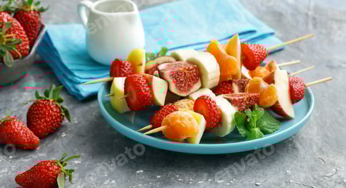 Preview: Delicious Fresh Fruit Skewers On A Table