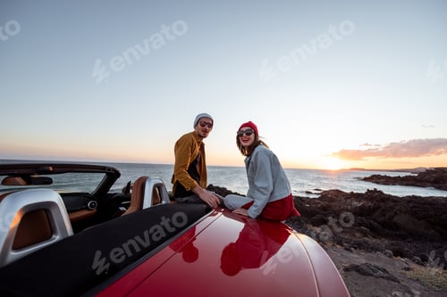 Preview: Lovely couple on the beach, traveling by car