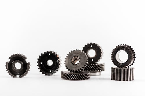 Preview: metal round gears on white background with copy space