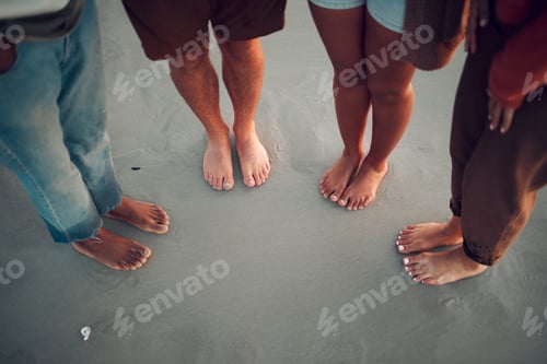 Preview: Friends, feet and beach in water, sand and travel summer vacation with diversity, men and women. Pe
