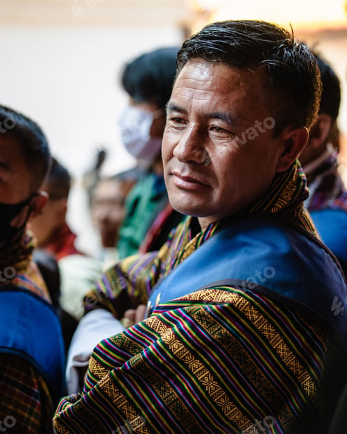 Preview: Bhutanese man worships at Tshechu festival