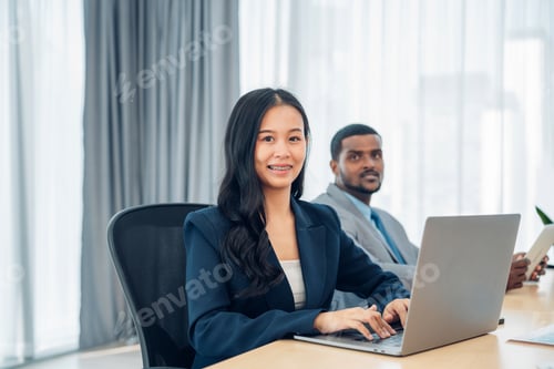 Preview: Successful businesswoman working at her office desk