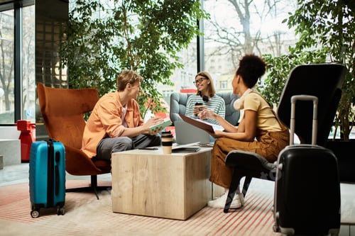 Preview: Colleagues engage in productive discussions during a hotel business trip