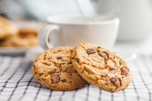 Preview: Sweet chocolate cookies on checkered napkin.
