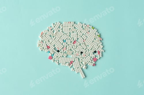 Preview: Creative brain shape made of white plastic blocks on pastel background symbolizing innovation