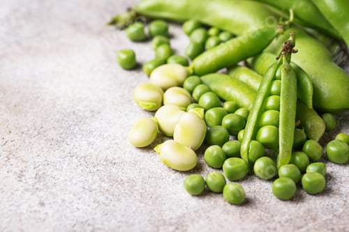 Preview: Fresh green peas and beans on light background