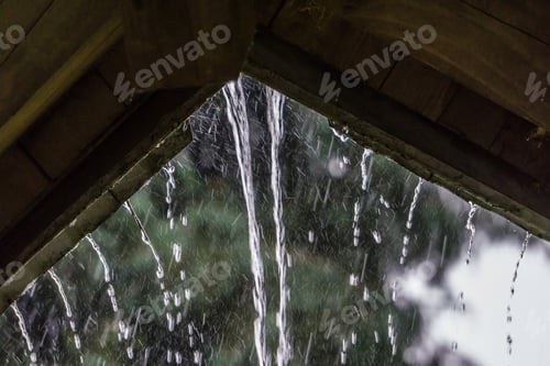 Preview: Raindrops Stream Off Of A Roof In Renton, Washington.