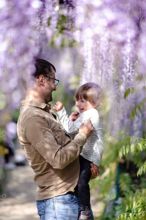 Preview: Boy with dad in the wisteria garden