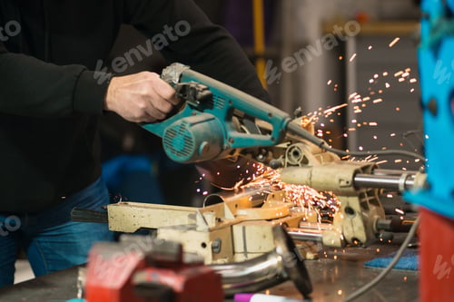 Preview: Men hands working in the garage with tools. Repair
