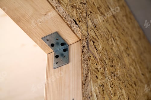 Preview: Close up detail of house construction wooden wall elements. Interior frame renovation work