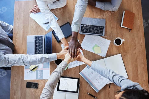 Preview: Shot of a group of unrecognizable businesspeople stacking their hands at work