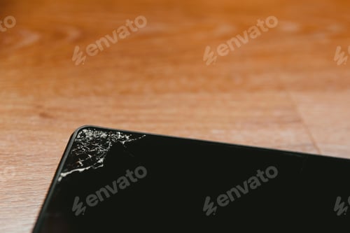 Preview: tablet computer screen with broken glass after a fall.