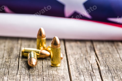 Preview: Pistol bullet and USA flag.