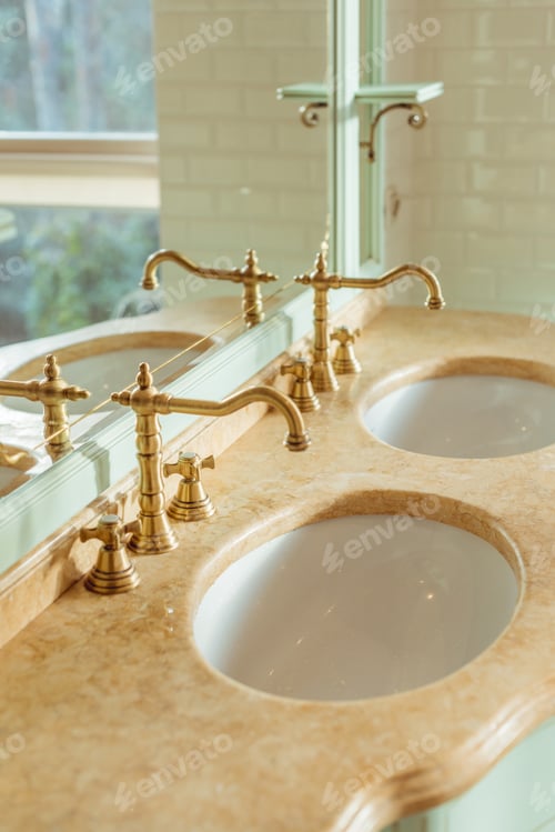 Preview: close-up view of two luxury sinks and mirror in bathroom interior
